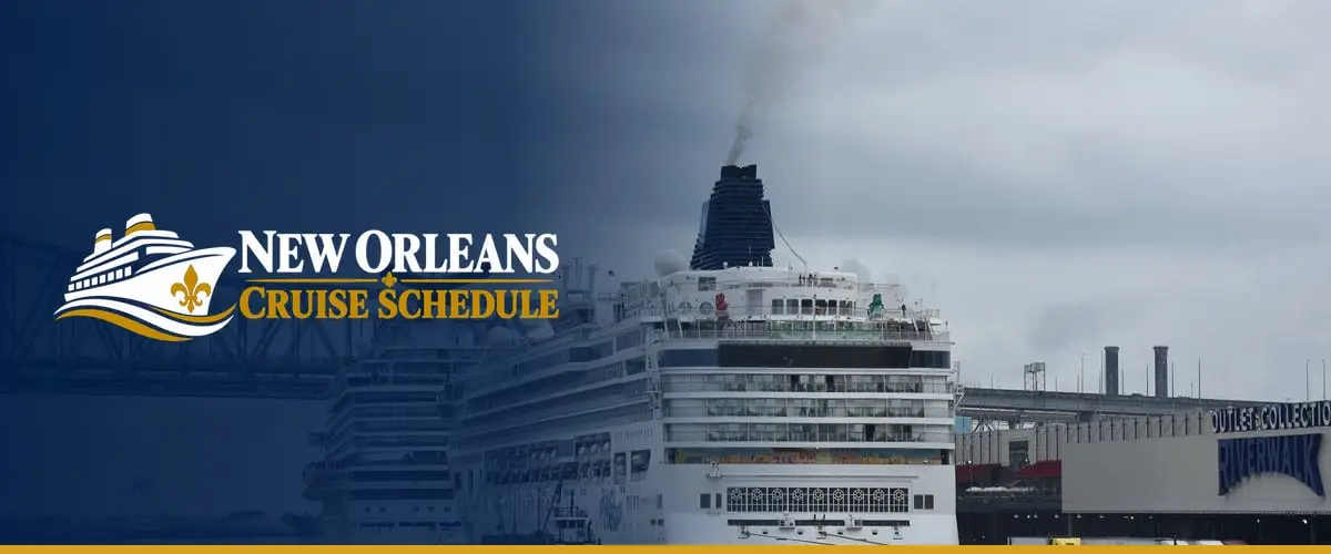 Cruise ships docked on the Mississippi River in New Orleans, with the Crescent City Connection behind them
